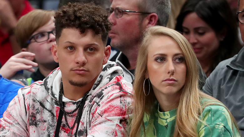 Brittany Mahomes, Patrick Mahomes with blank expressions