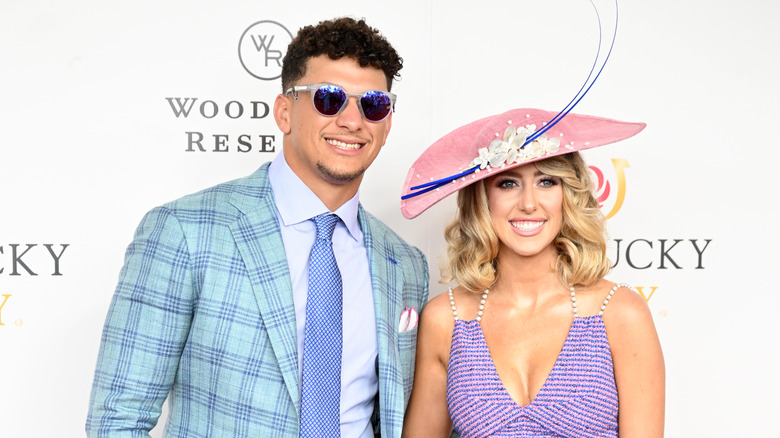 Patrick Mahomes, Brittany Mahomes posing