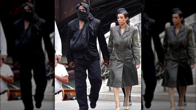 Kanye West and Bianco Censori walking