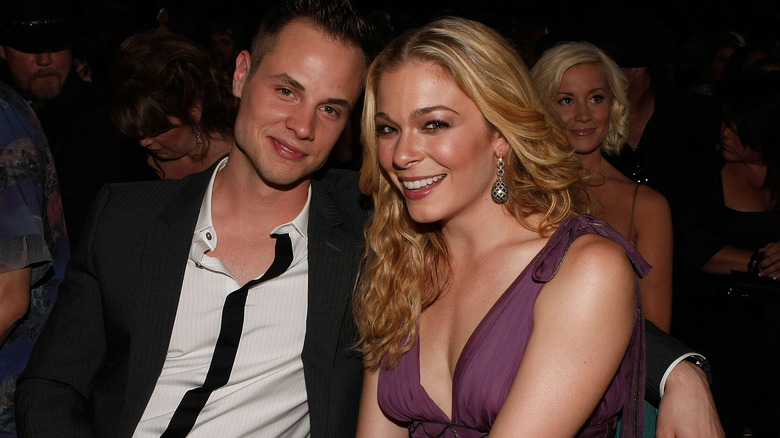 LeAnn Rimes and Dean Sheremet, seated and smiling