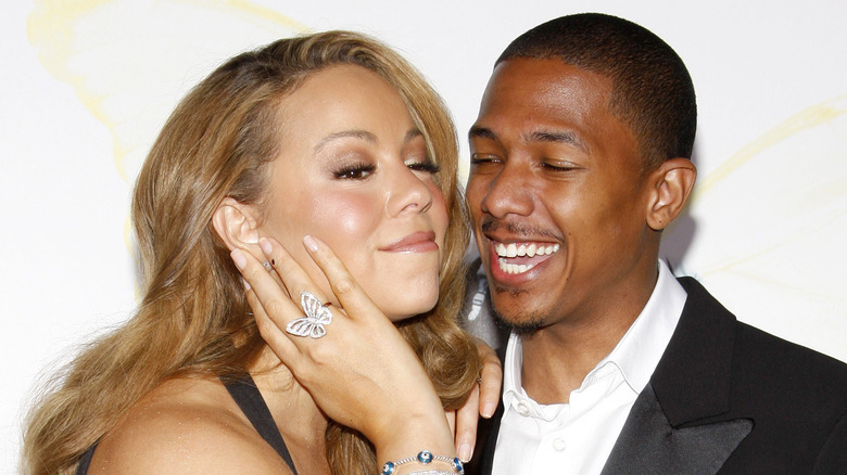 Mariah Carey posing with Nick Cannon