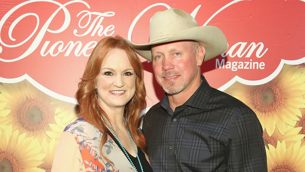 Ree Drummond and Ladd Drummond pose