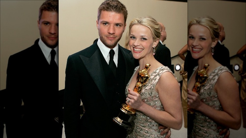Ryan Phillippe and Reese Witherspoon with Oscar