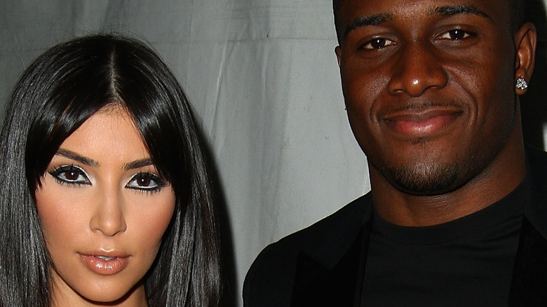 Kim Kardashian and Reggie Bush on the red carpet