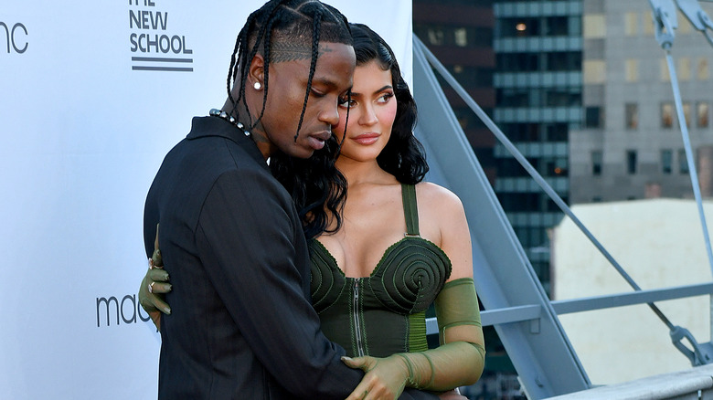 Travis Scott and Kylie Jenner posing