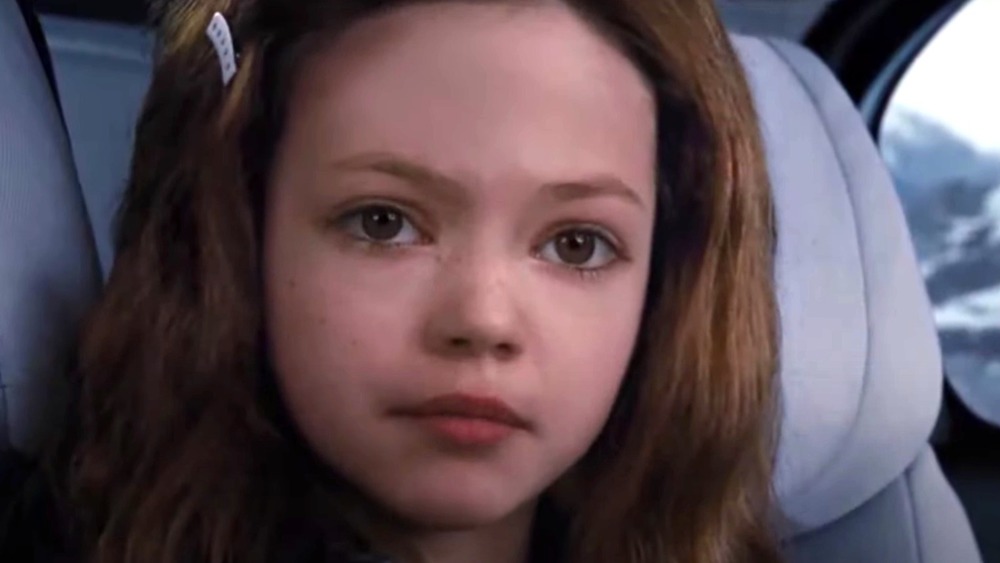 Renesmee looking sad in the car in Twilight: Breaking Dawn - Part 2 