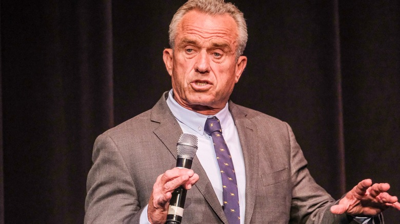 Robert F. Kennedy Jr. holding a microphone