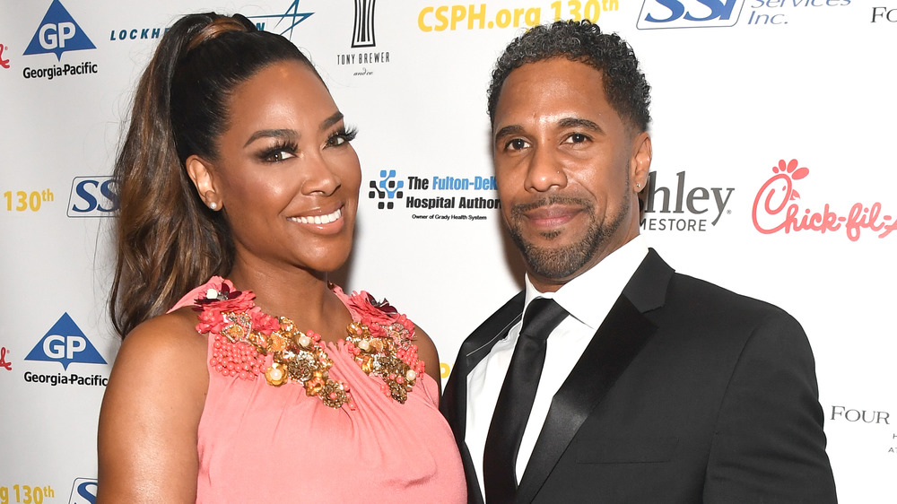 Kenya Moore and Marc Daly at event