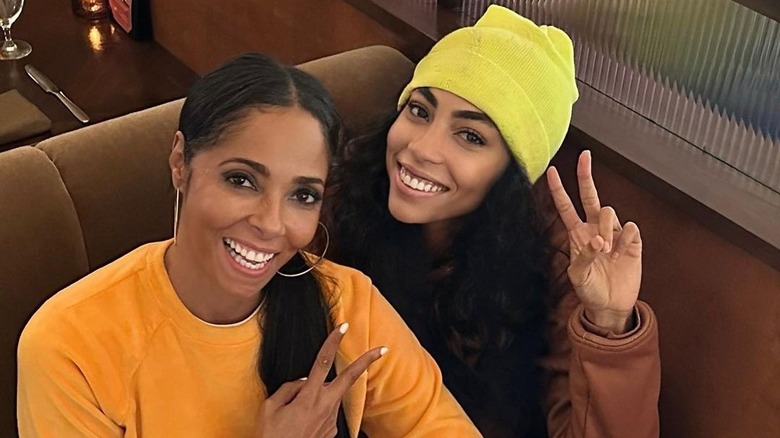 Courtney Rhodes posing with daughter Lala