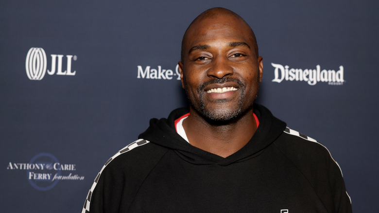 Marcellus Wiley smiling at red carpet event