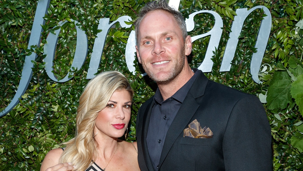 Alexis Bellino and Andy Bohn on a red carpet