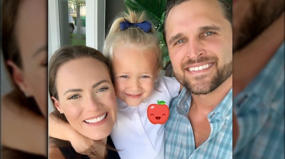 Kara Bosworth and family smiling in a selfie on Instagram