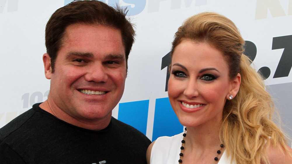 Stephanie and Travis Hollman posing at a KIIS FM event