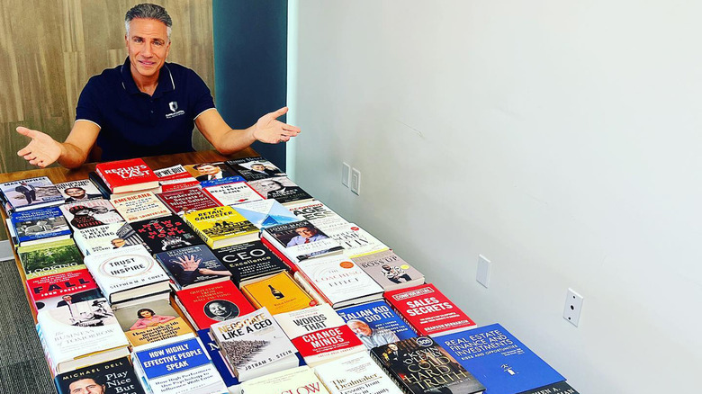 Todd Nepola table full of books