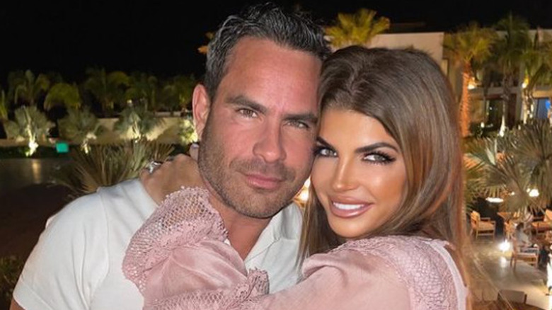 Luis Ruelas and Teresa Giudice smile