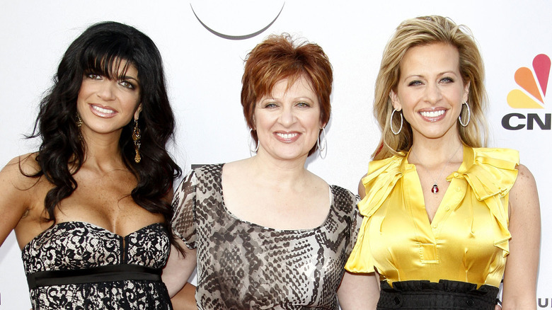 Teresa Giudice, Caroline Manzo, and Dina Cantin posing