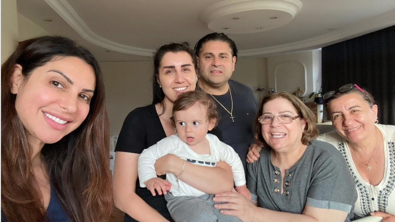 Jennifer Aydin poses with her family in Turkey