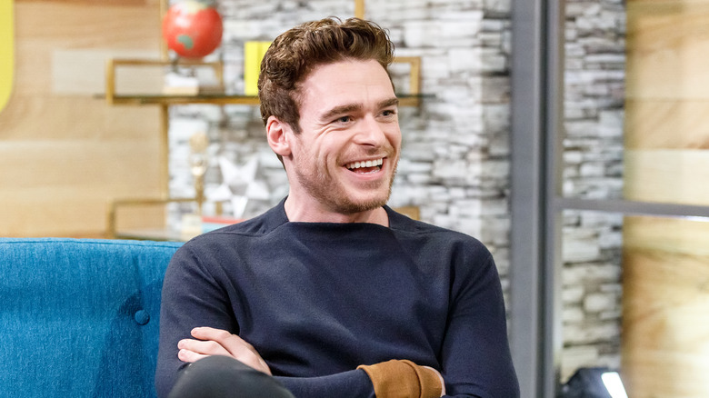 Richard Madden laughing