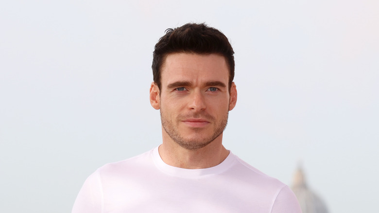 Richard Madden posing