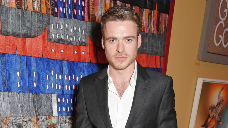 Richard Madden posing