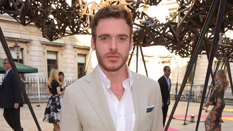 Richard Madden posing