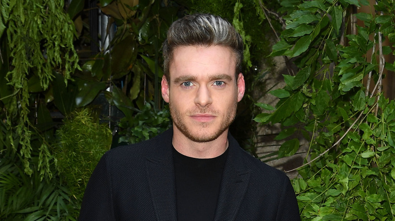 Richard Madden posing