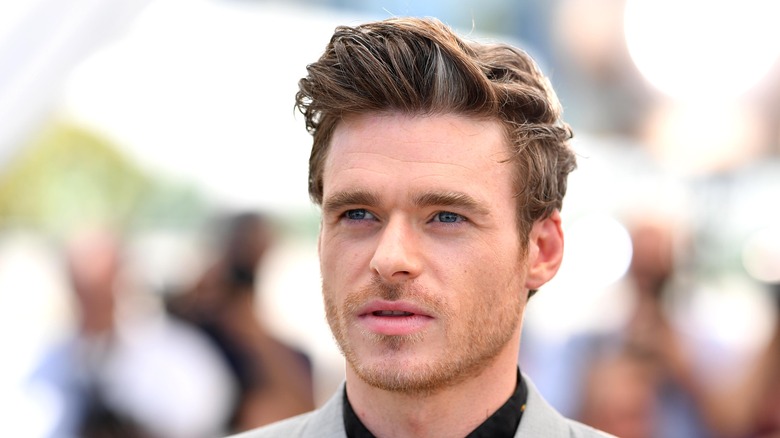 Richard Madden posing