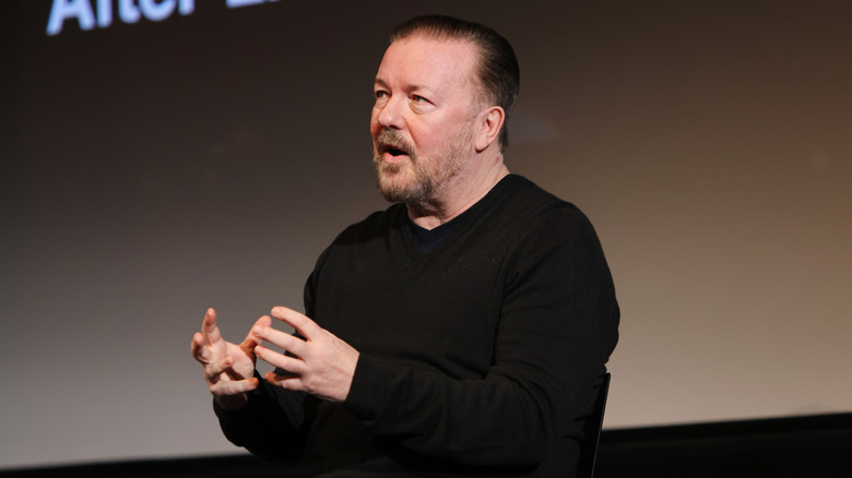 Ricky Gervais speaking at an event 