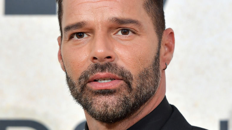 Ricky Martin looking worried full beard