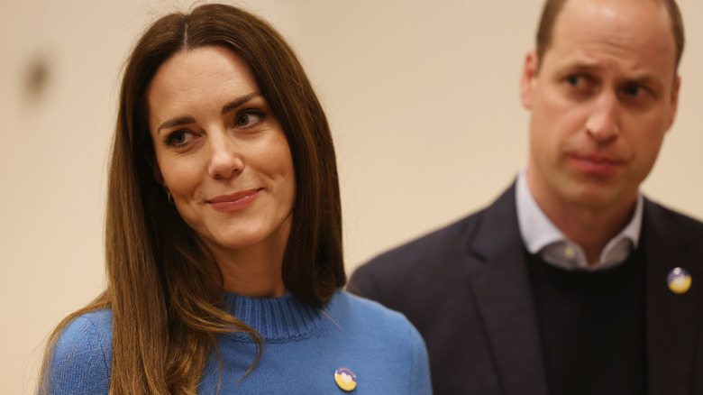 Kate Middleton wearing blue sweater