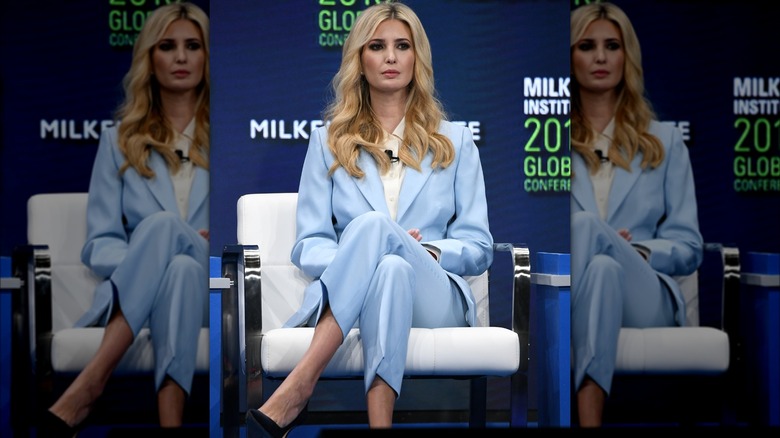 Ivanka Trump sitting and wearing baby blue suit