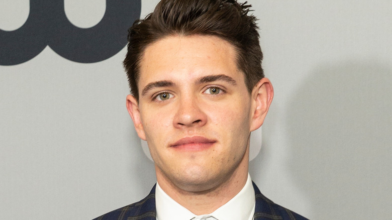 Casey Cott posing for cameras