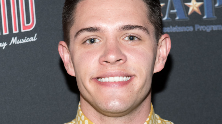 Casey Cott posing for cameras