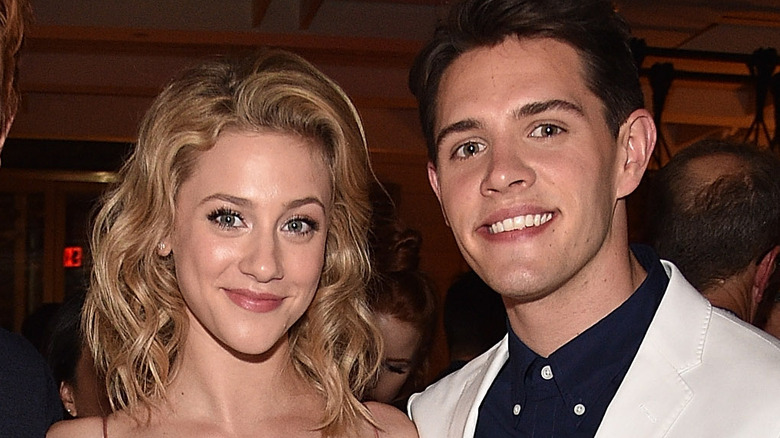 Lili Reinhart and Casey Cott posing together