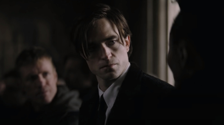 Robert Pattinson as Bruce Wayne with a serious look