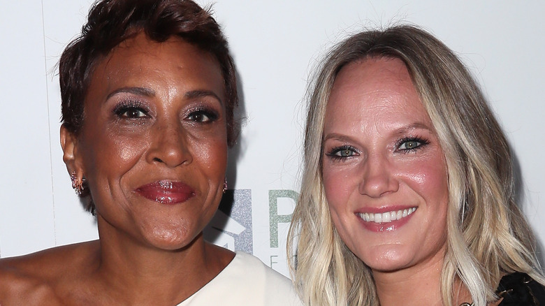 Robin Roberts and Amber Laign pose together at an event