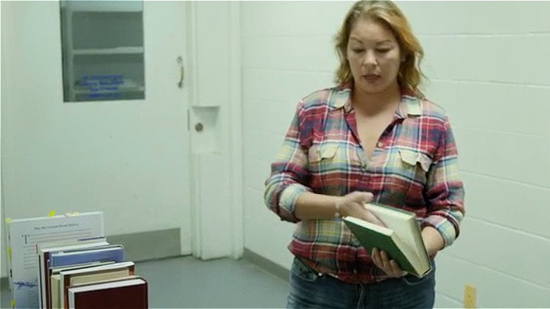 Robyn Adams with book cart 