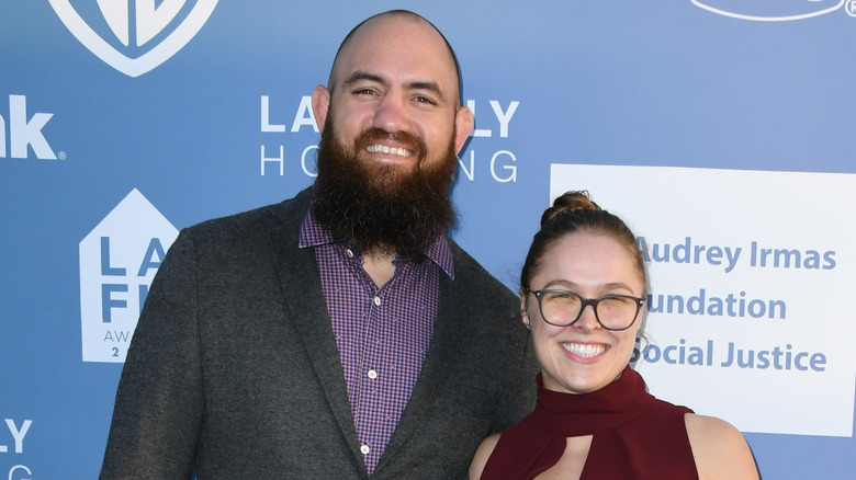 Ronda Rousey and husband Travis Browne smiling