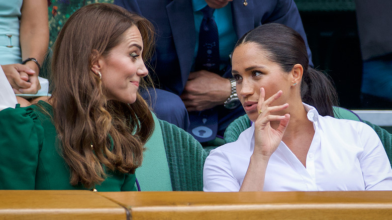 Kate Middleton and Meghan Markle speaking