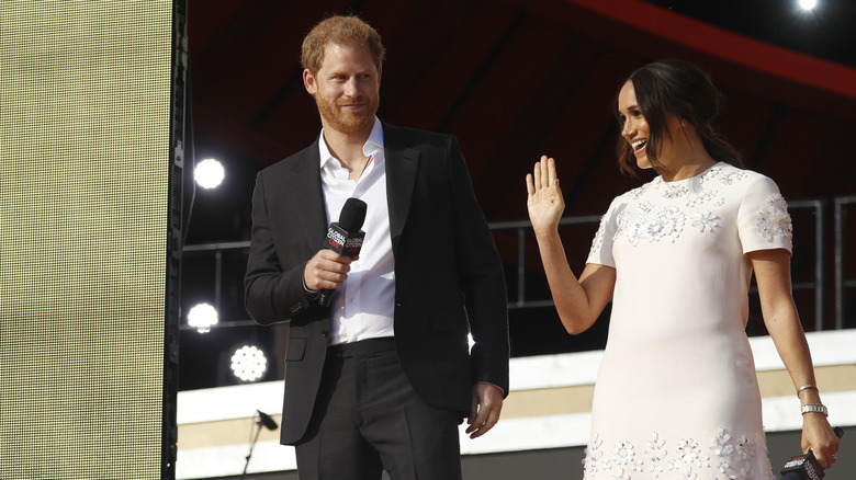 Prince Harry and Meghan Markle smiling