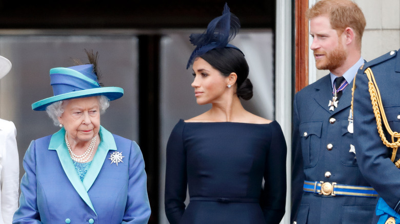 Queen Elizabeth with Meghan Markle and Prince Harry