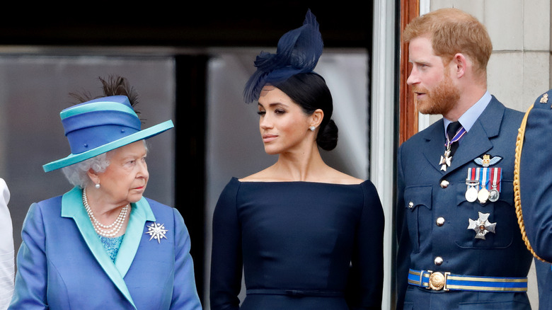 Queen Elizabeth with Meghan and Harry