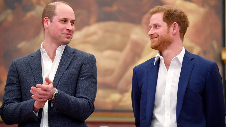 Prince William and Prince Harry looking at each other