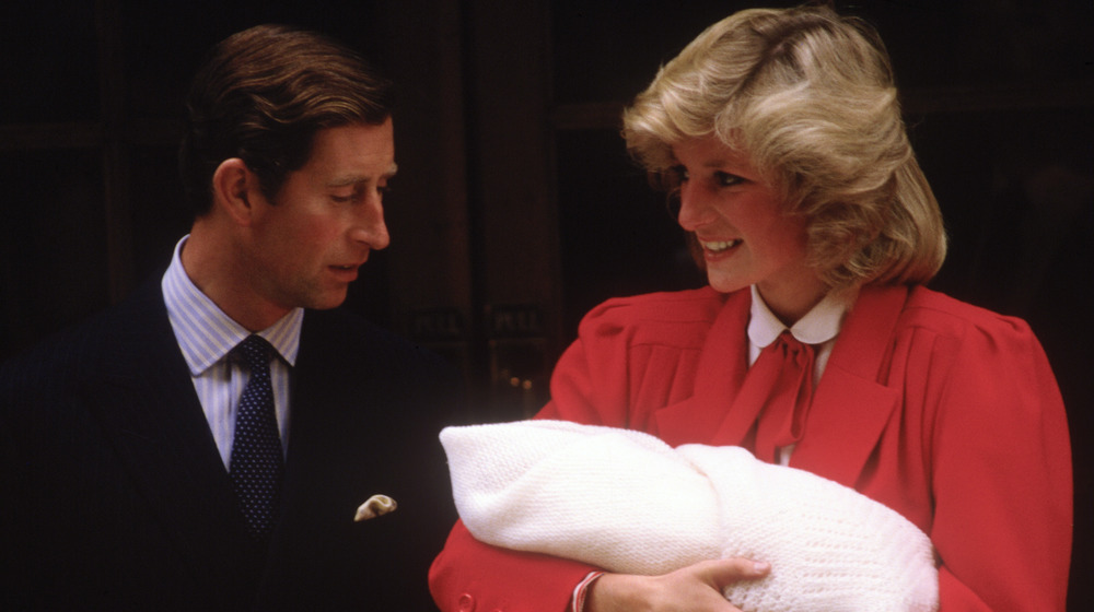 Prince Charles and Princess Diana leaving the hospital with Prince Harry in 1984