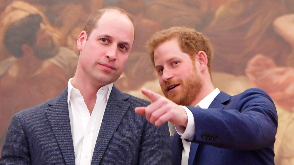 Prince William and Prince Harry chatting at a royal event