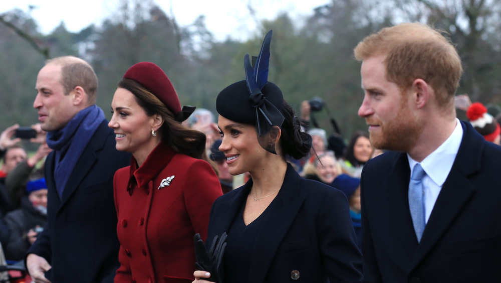 Prince William with Kate Middleton, Meghan Markle, and Prince Harry at an event