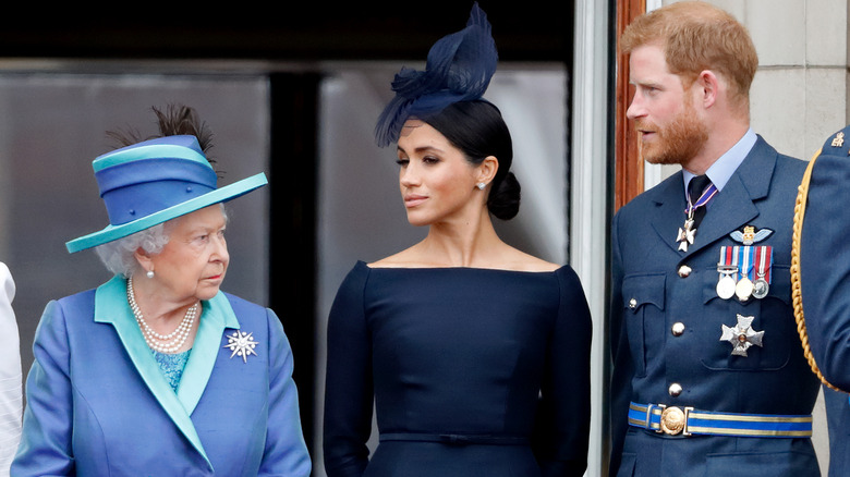 Queen Elizabeth with Meghan Markle and Prince Harry