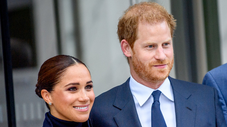 Prince Harry standing in front of a crowd