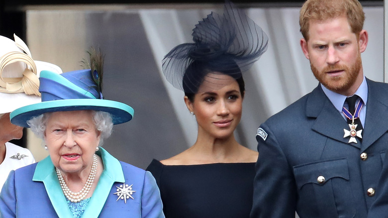 Queen Elizabeth with Meghan Markle and Prince Harry