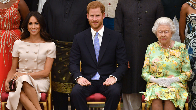 Queen Elizabeth with Meghan Markle and Prince Harry